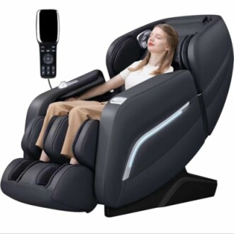 Woman relaxing in a black luxury massage chair with remote control.