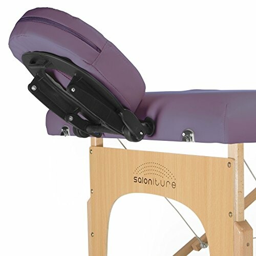 Close-up of a massage table headrest and support frame.